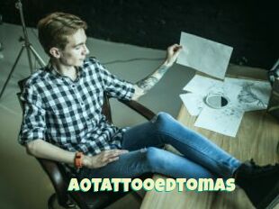 A0TattooedTomas